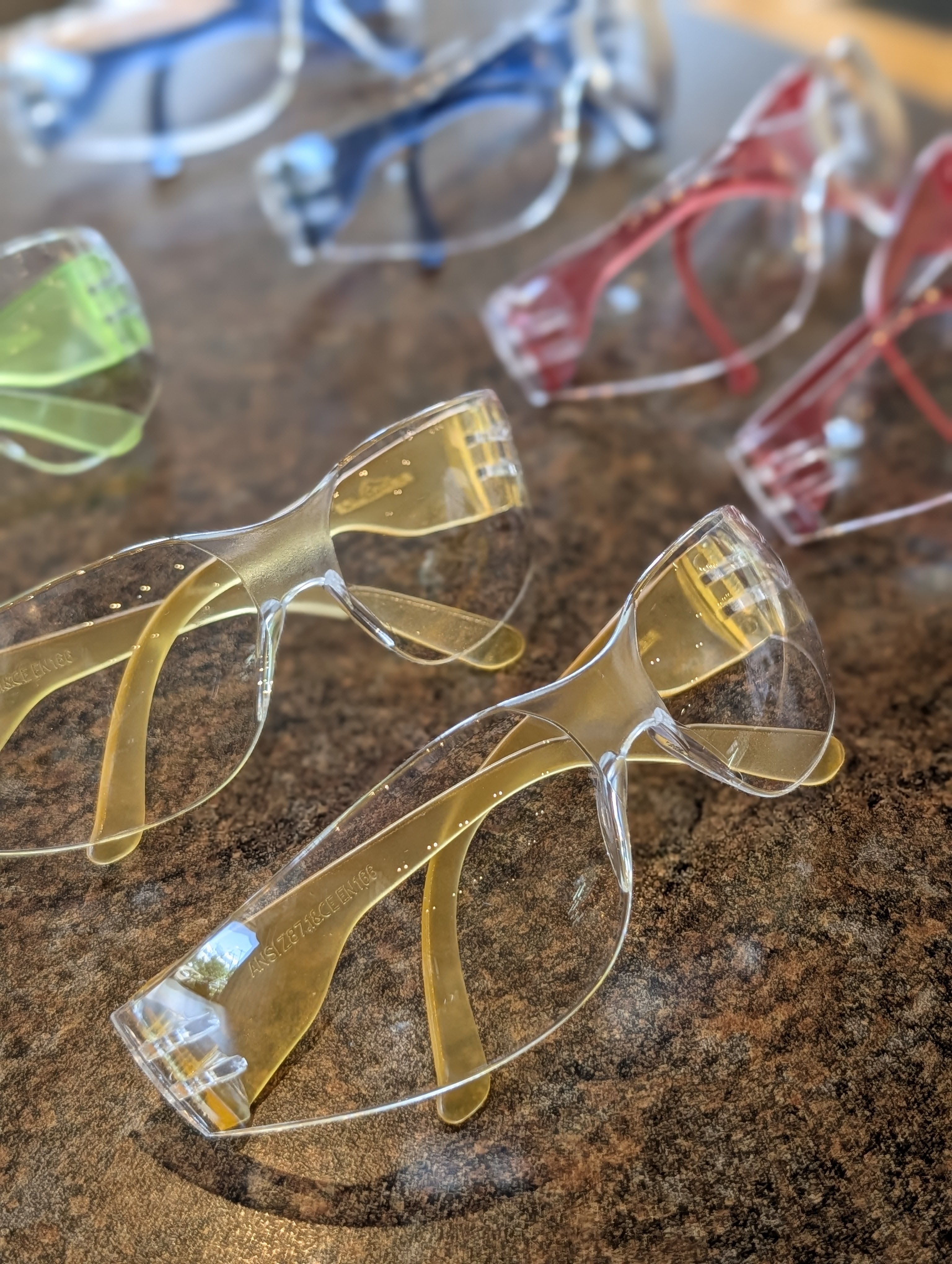 Colorful eye protection sitting on a table